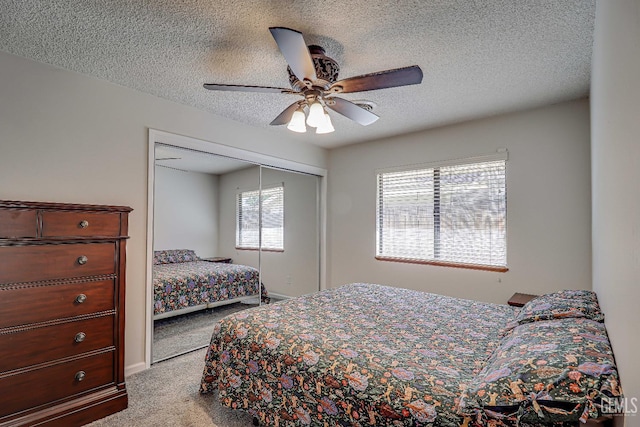 9604 Lea Oak Rd, Bakersfield, CA 93311 - carpeted bedroom with a closet, a textured ceiling, and ceiling fan