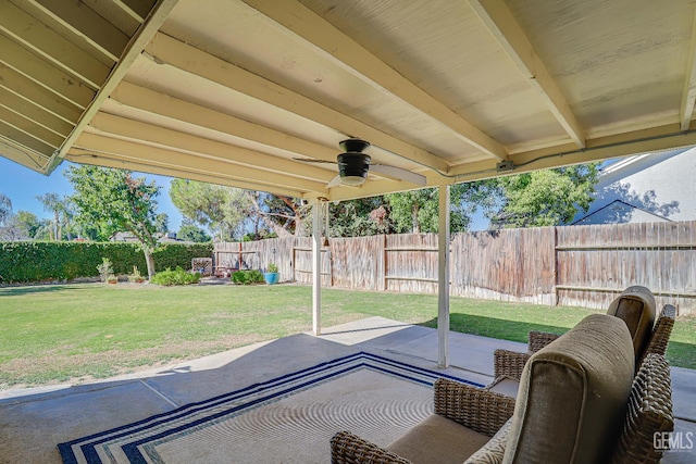 9604 Lea Oak Rd, Bakersfield, CA 93311 - fenced backyard with a patio area and a ceiling fan