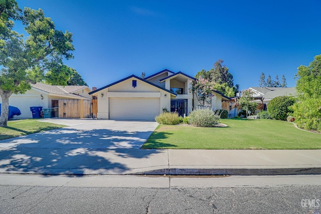 9604 Lea Oak Rd, Bakersfield, CA 93311 - mid-century inspired home with a garage, driveway, and stucco siding