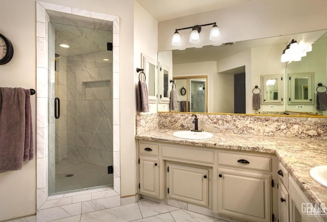 9604 Lea Oak Rd, Bakersfield, CA 93311 - full bath with marble look tile flooring, double vanity, and a stall shower