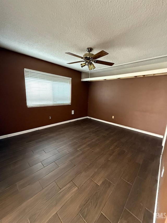 unfurnished room with a textured ceiling and ceiling fan