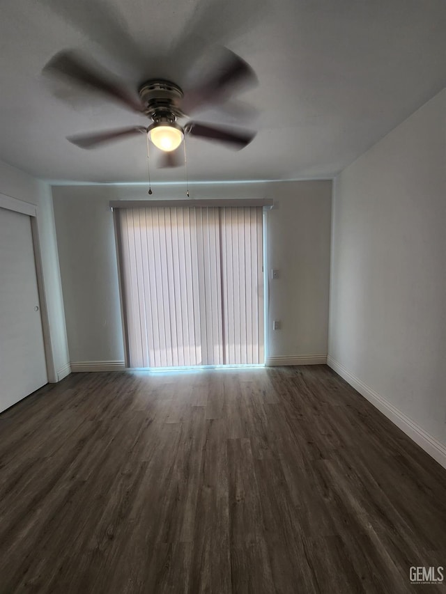 5812 Appletree Ln, Bakersfield, CA 93309 - spare room with dark wood-type flooring and a ceiling fan