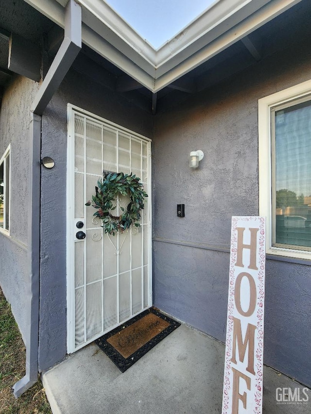 5812 Appletree Ln, Bakersfield, CA 93309 - view of exterior entry with stucco siding