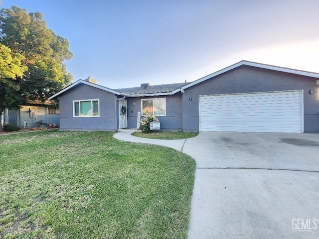 5812 Appletree Ln, Bakersfield, CA 93309 - ranch-style home with a garage, driveway, a front yard, stucco siding, and a chimney
