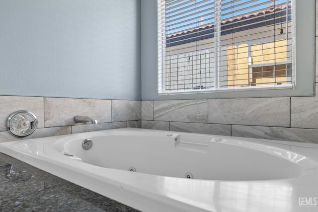10415 Olympia Fields Dr, Bakersfield, CA 93312 - bathroom with healthy amount of natural light and a tub with jets