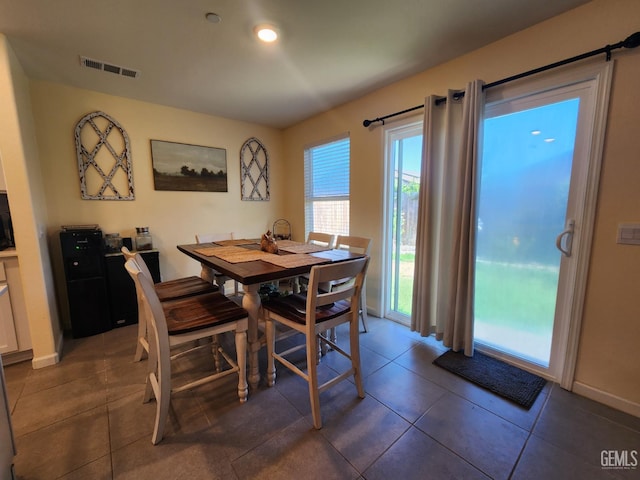 5911 Bogart Dr, Bakersfield, CA 93313 - tiled dining room with baseboards