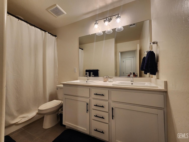 5911 Bogart Dr, Bakersfield, CA 93313 - bathroom featuring tile patterned floors, double vanity, a shower with curtain, and a textured wall