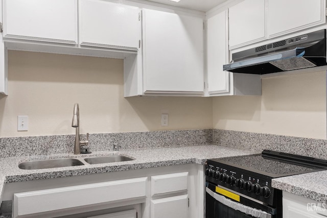 kitchen featuring white cabinetry, sink, and black range with electric cooktop