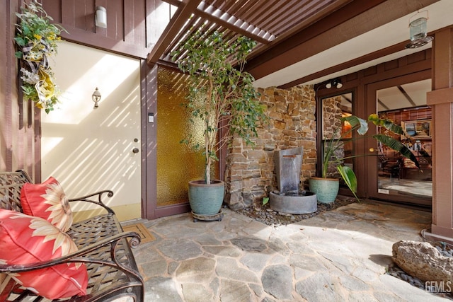 view of patio with a pergola and french doors