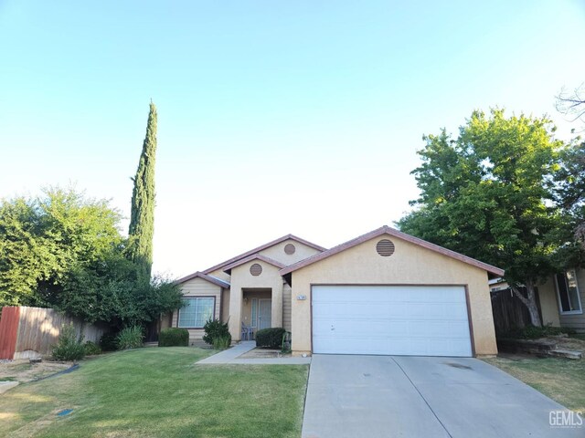 6208 Stonegate Dr, Bakersfield, CA 93306 - single story home featuring a garage, concrete driveway, and stucco siding