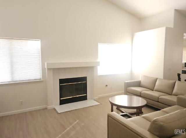 6208 Stonegate Dr, Bakersfield, CA 93306 - living room with a tiled fireplace and wood finished floors