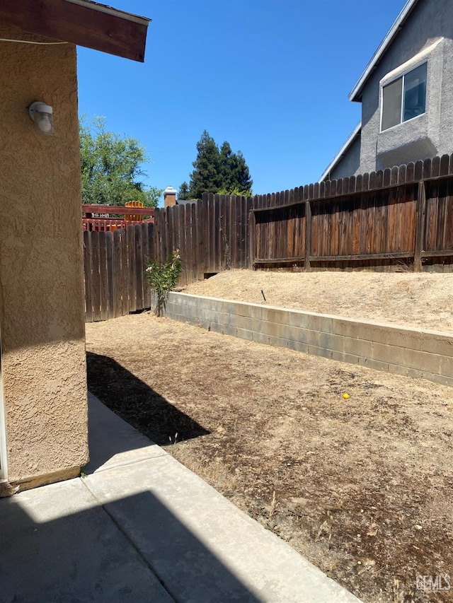 6208 Stonegate Dr, Bakersfield, CA 93306 - fenced backyard featuring a patio