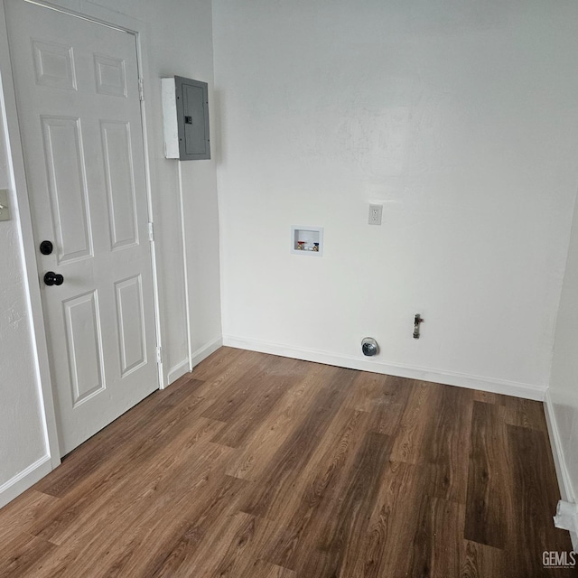 145 T St, Bakersfield, CA 93304 - washroom with laundry area, wood finished floors, hookup for a washing machine, and electric panel
