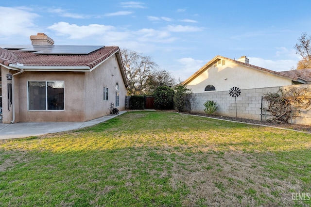 view of yard with a fenced backyard and a patio