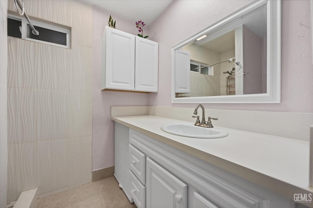 bathroom featuring tile patterned floors and vanity