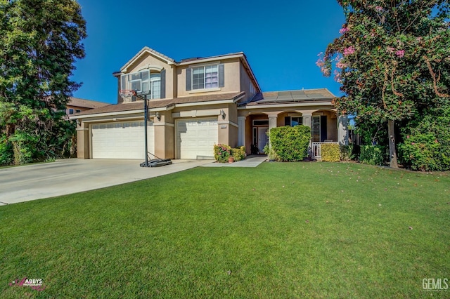 view of front of property featuring solar panels, a garage, and a front lawn