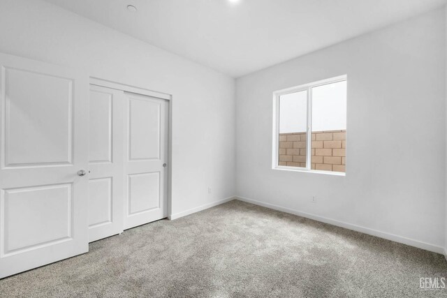 5111 Beaverhead Ave, Bakersfield, CA 93306 - unfurnished bedroom featuring carpet floors and a closet
