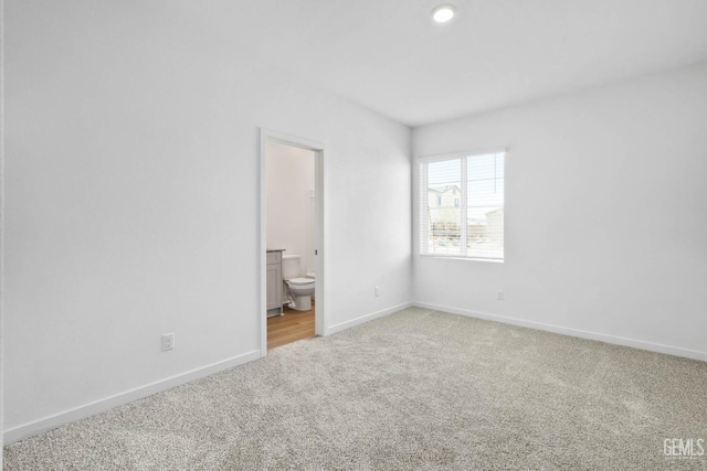 5111 Beaverhead Ave, Bakersfield, CA 93306 - unfurnished bedroom with light colored carpet and ensuite bath