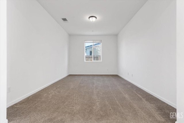 view of carpeted spare room