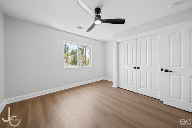 11009 Bright Water Way, Bakersfield, CA 93311 - unfurnished bedroom with wood finished floors, baseboards, a closet, and ceiling fan