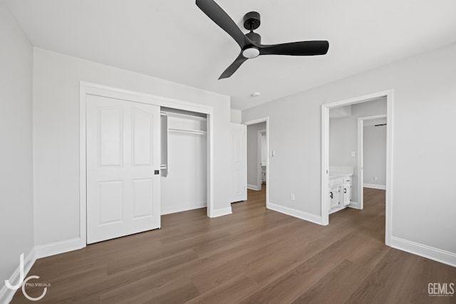 11009 Bright Water Way, Bakersfield, CA 93311 - unfurnished bedroom featuring dark wood-type flooring, baseboards, a closet, and a ceiling fan