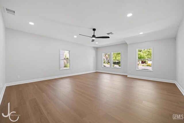 11009 Bright Water Way, Bakersfield, CA 93311 - spare room with a ceiling fan, recessed lighting, wood finished floors, and baseboards