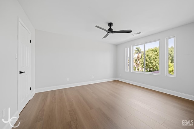 11009 Bright Water Way, Bakersfield, CA 93311 - spare room featuring wood finished floors, ceiling fan, and baseboards