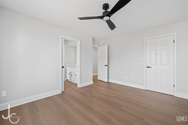11009 Bright Water Way, Bakersfield, CA 93311 - unfurnished bedroom with wood finished floors, baseboards, ensuite bathroom, and a ceiling fan