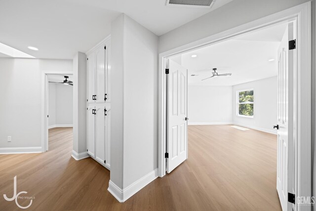 11009 Bright Water Way, Bakersfield, CA 93311 - hall featuring light wood-style flooring, baseboards, and recessed lighting