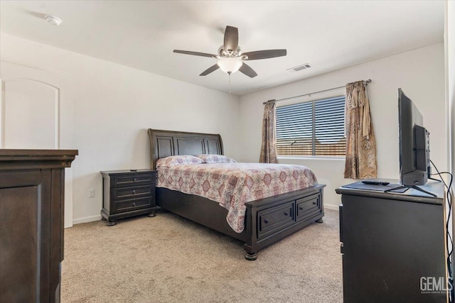 bedroom featuring ceiling fan and light colored carpet