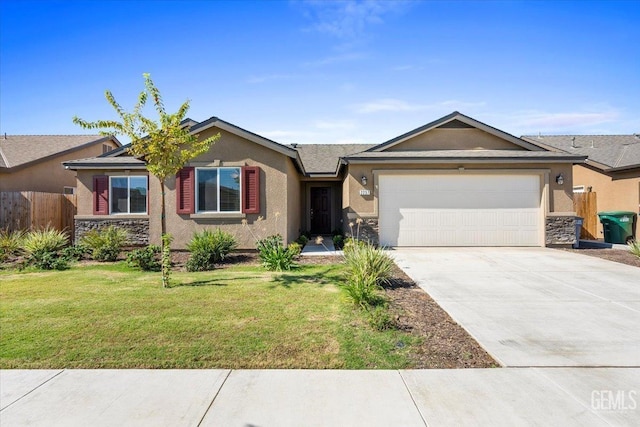 single story home featuring a garage and a front yard