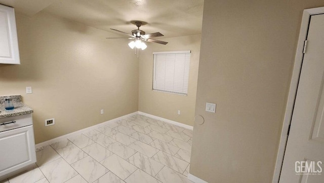 interior space featuring ceiling fan