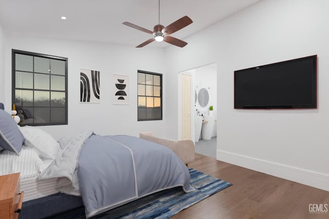 bedroom featuring recessed lighting, wood finished floors, a ceiling fan, baseboards, and vaulted ceiling