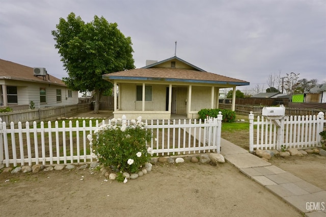 view of front of property featuring covered porch