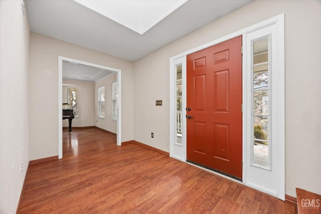 entrance foyer with hardwood / wood-style flooring