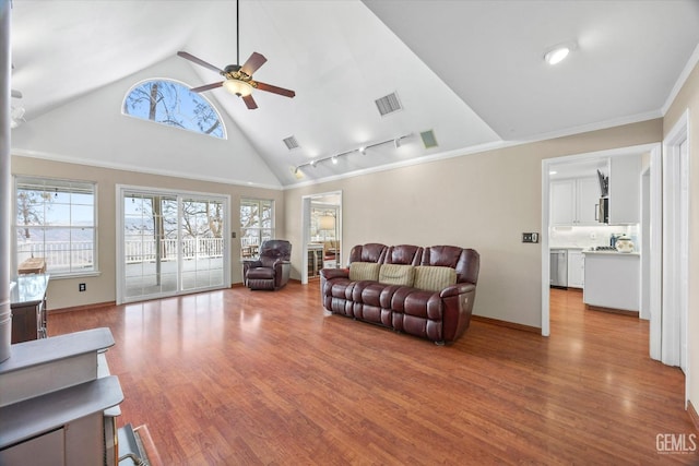 living room featuring crown molding, ceiling fan, high vaulted ceiling, and light hardwood / wood-style flooring