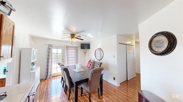 dining area featuring ceiling fan