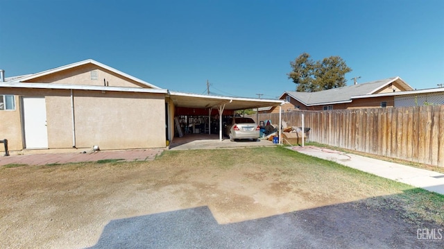 view of yard featuring a carport