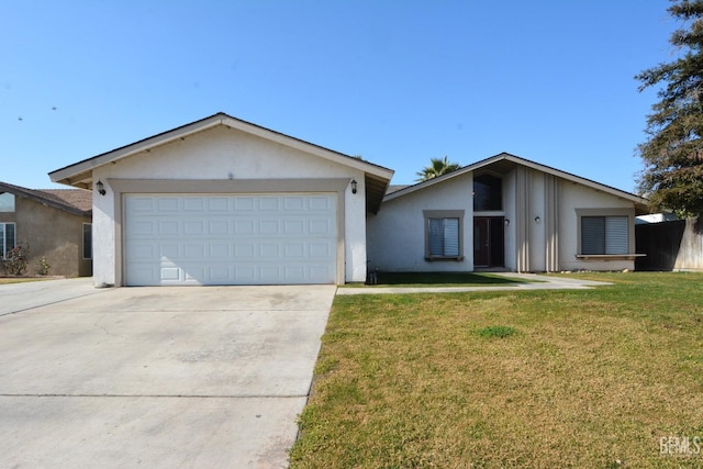 ranch-style home featuring a garage and a front yard