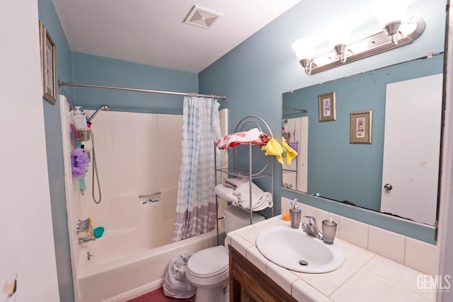 full bathroom with toilet, shower / bath combo, visible vents, and vanity