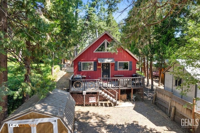 exterior space featuring a wooden deck