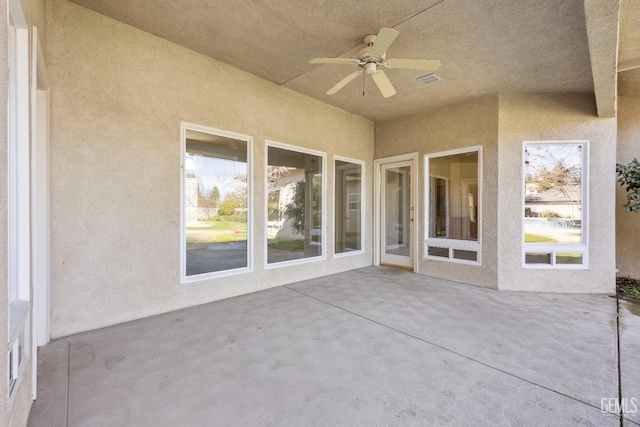 view of patio / terrace with a ceiling fan