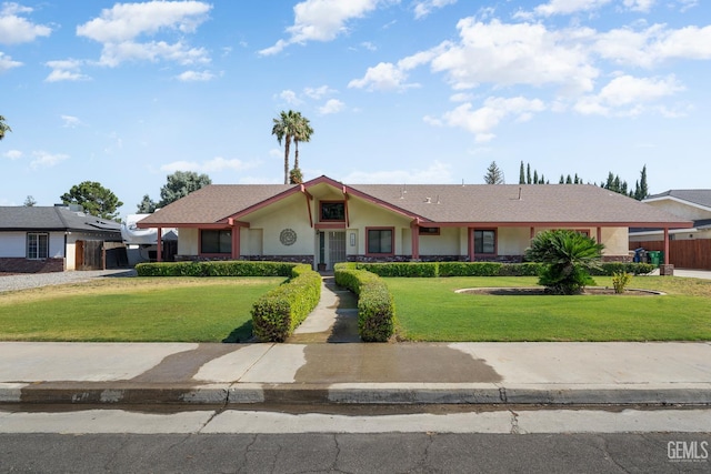 11906 Christy Ave, Bakersfield, CA 93312 - view of front facade with a front lawn and stucco siding