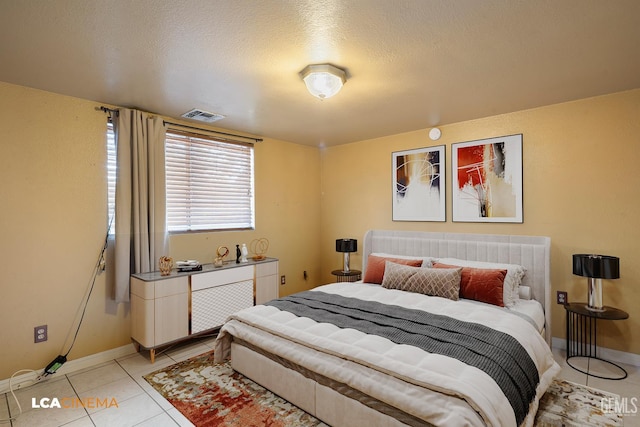 11906 Christy Ave, Bakersfield, CA 93312 - bedroom featuring light tile patterned floors and a textured ceiling