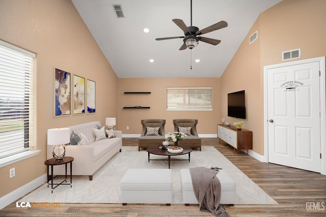 11906 Christy Ave, Bakersfield, CA 93312 - living room featuring high vaulted ceiling, wood finished floors, a ceiling fan, and recessed lighting