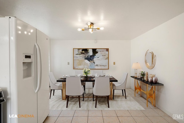 11906 Christy Ave, Bakersfield, CA 93312 - dining area featuring a chandelier and light tile patterned floors