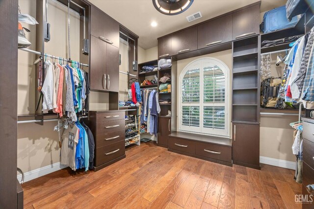 11416 Queensbury Dr, Bakersfield, CA 93312 - walk in closet featuring light wood-type flooring