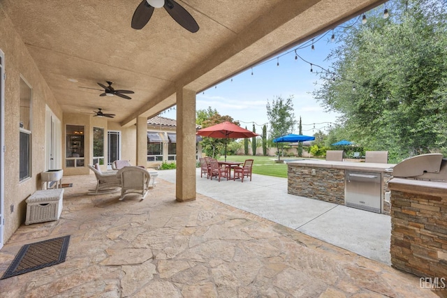 11416 Queensbury Dr, Bakersfield, CA 93312 - view of patio with an outdoor kitchen, a ceiling fan, and outdoor dining area