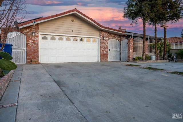 single story home featuring a garage