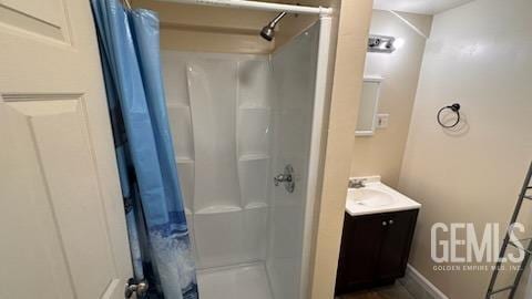 bathroom featuring vanity and walk in shower